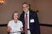 Prof. Andrés Tremante giving Dr. Claudia de Vilhena Schayer Sabino the best paper award certificate of the session "Aplicaciones de I&C en Ciencia e Ingeniería / Info-Cibernética." The title of the awarded paper is "Estabelecimento de um Índice Local de Qualidade das Águas Utilizando Estatística Multivariada Robusta: Uma Abordagem Aplicada aos Reservatórios em Cascata Jaguara, Igarapava e Volta Grande (MG - Br)."